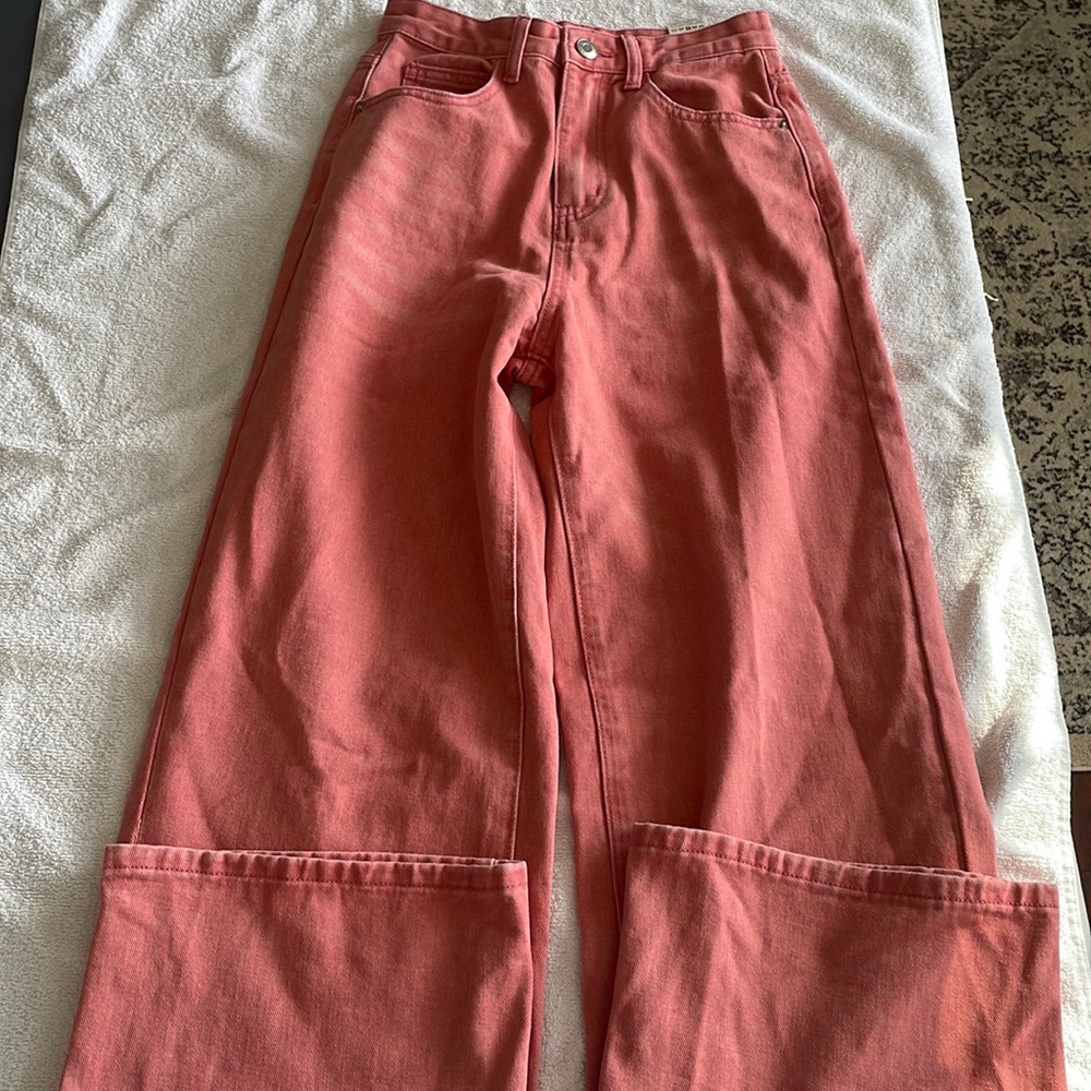 pink baggy jeans 
(i’m unsure the brand)
size medium